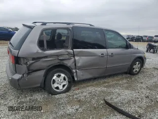2000 Honda Odyssey EX with VIN 2HKRL1865YH513885, listed as a Copart auction lot 50223505 with 214,627 mi miles and Salvage Title. Bid and sale history available at DreamBid. Image 3.