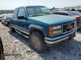 1997 GMC Sierra 2500 z VIN 1GTGK29JXVE562949, wystawiony jako Copart lot #68270174 z przebiegiem 212 422 mil mil oraz Szkody całkowita. Historia ofert i sprzedaży dostępna na DreamBid. Obrazek 4.