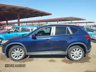 2014 Mazda CX-5 Grand Touring with VIN JM3KE2DY2E0349343, listed as a IAAI auction lot 41725214 with 271,094 mi miles. Bid and sale history available at carsss.com. Image 14.