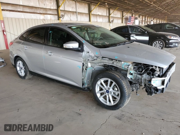 2015 Ford Focus SE with VIN 1FADP3F20FL232196, listed as a Copart auction lot 64829835 with 31,294 mi miles and Salvage title. Bid and sale history available at DreamBid. Image 4.