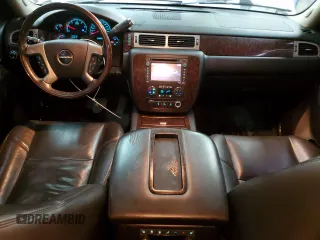 2014 GMC Yukon Denali with VIN 1GKS2EEF6ER141112, listed as a Copart auction lot 88526685 with 142,248 mi miles and Salvage Title. Bid and sale history available at carsss.com. Image 8.