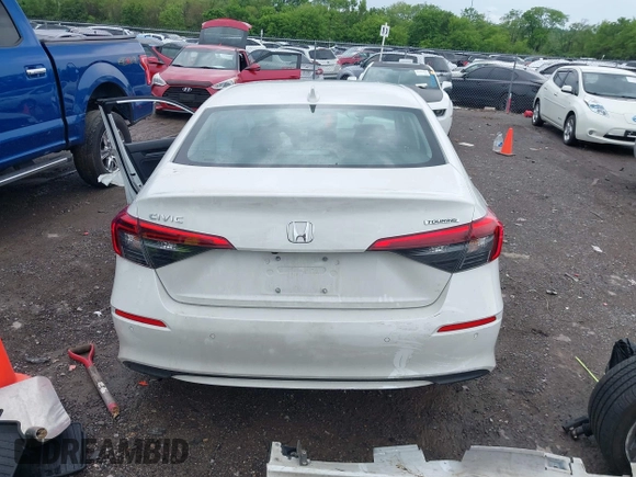 2024 Honda Civic Touring z VIN 2HGFE1F93RH341247, wystawiony jako IAAI lot #42102894 z przebiegiem Nie podano mil oraz . Historia ofert i sprzedaży dostępna na DreamBid. Obrazek 16.