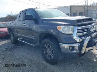 2016 Toyota Tundra 4WD Truck SR with VIN 5TFUW5F19GX548996, listed as a IAAI auction lot 41607605 with 101,194 mi miles. Bid and sale history available at carsss.com. Image 1.