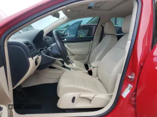 2010 Volkswagen Jetta Wolfsburg Edition with VIN 3VWRJ7AJXAM154666, listed as a Copart auction lot 60556875 with 149,509 mi miles and Salvage title. Bid and sale history available at DreamBid. Image 7.
