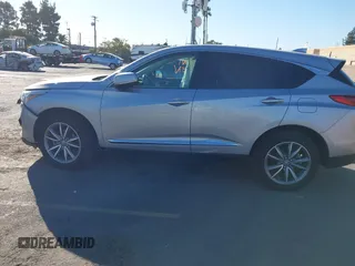 2020 Acura RDX Technology z VIN 5J8TC1H58LL008054, wystawiony jako IAAI lot #41336305 z przebiegiem 42 341 mil mil oraz . Historia ofert i sprzedaży dostępna na DreamBid. Obrazek 14.