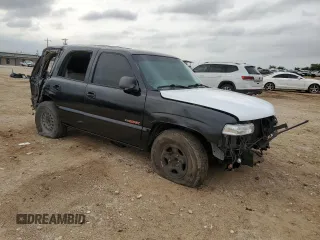 2002 Chevrolet Tahoe LS with VIN 1GNEC13Z52R230281, listed as a Copart auction lot 53447985 with 309,170 mi miles and Salvage title. Bid and sale history available at DreamBid. Image 4.