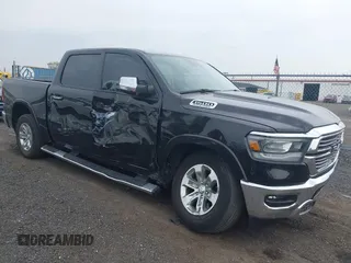 2021 Ram 1500 Laramie with VIN 1C6SRFJT1MN774221, listed as a IAAI auction lot 42505708 with 48,645 mi miles and . Bid and sale history available at DreamBid. Image 1.