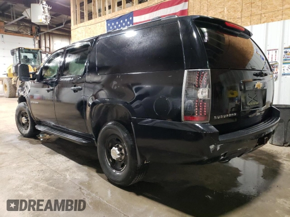 2013 Chevrolet Suburban with VIN 1GNWK5EG4DR246825, listed as a Copart auction lot 56764205 with 162,459 mi miles and Salvage title. Bid and sale history available at DreamBid. Image 2.
