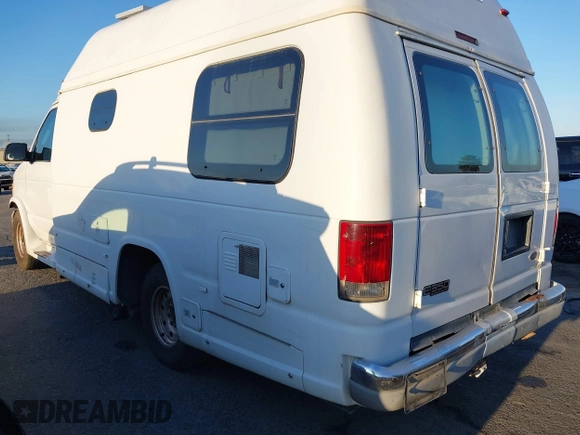 2002 Ford Econoline Cargo z VIN 1FDSE34L72HB41096, wystawiony jako IAAI lot #37394945 z przebiegiem 241 707 mil mil oraz . Historia ofert i sprzedaży dostępna na DreamBid. Obrazek 3.
