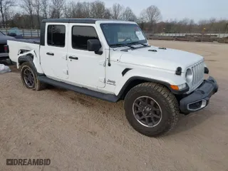 2022 Jeep Gladiator High Altitude with VIN 1C6HJTFG0NL141296, listed as a IAAI auction lot 41795033 with 39,768 mi miles. Bid and sale history available at carsss.com. Image 1.