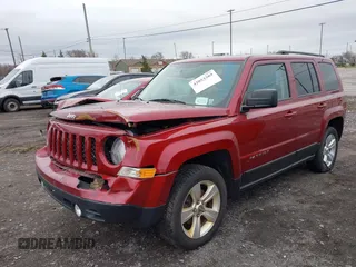 2014 Jeep Patriot Latitude with VIN 1C4NJRFB6ED892819, listed as a IAAI auction lot 42053389 with 92,213 mi miles and . Bid and sale history available at carsss.com. Image 2.