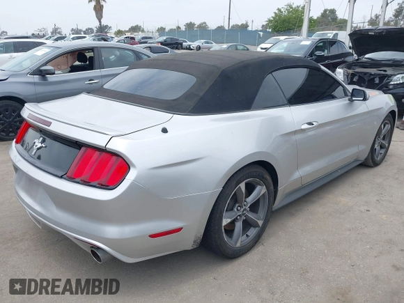 2015 Ford Mustang V6 with VIN 1FATP8EM5F5418946, listed as a IAAI auction lot 42375040 with 127,968 mi miles and . Bid and sale history available at DreamBid. Image 4.