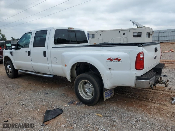 2008 Ford Super Duty F-350 DRW XL with VIN 1FTWW33R38EA40513, listed as a Copart auction lot 66915524 with 186,850 mi miles and Salvage Title. Bid and sale history available at carsss.com. Image 2.