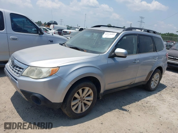 2012 Subaru Forester X Premium with VIN JF2SHBDC0CH409737, listed as a IAAI auction lot 42564484 with 226,983 mi miles and . Bid and sale history available at DreamBid. Image 2.