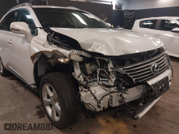 2013 Lexus RX 350 z VIN 2T2BK1BA1DC221743, wystawiony jako IAAI lot #42336253 z przebiegiem 62 754 mil mil oraz . Historia ofert i sprzedaży dostępna na DreamBid. Obrazek 6.