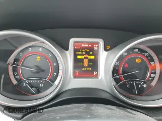 2017 Dodge Journey SE z VIN 3C4PDCAB1HT709104, wystawiony jako Copart lot #57132935 z przebiegiem 89 024 mil mil oraz Szkoda całkowita • Salvage title. Historia ofert i sprzedaży dostępna na DreamBid. Obrazek 9.