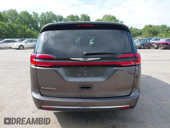 2023 Chrysler Pacifica Touring L with VIN 2C4RC1BG6PR612749, listed as a IAAI auction lot 42612932 with 69,931 mi miles and . Bid and sale history available at DreamBid. Image 16.