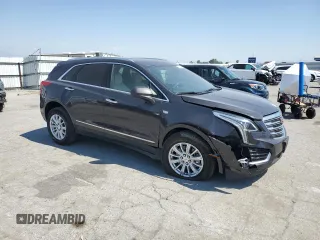 2018 Cadillac XT5 FWD with VIN 1GYKNARS5JZ155879, listed as a Copart auction lot 59568525 with 88,376 mi miles and Salvage title. Bid and sale history available at DreamBid. Image 4.