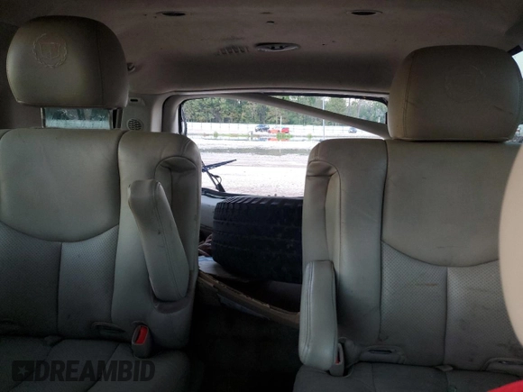 2003 Cadillac Escalade z VIN 1GYEC63T63R139405, wystawiony jako Copart lot #88884095 z przebiegiem Nie podano mil oraz Szkoda całkowita • Salvage title. Historia ofert i sprzedaży dostępna na DreamBid. Obrazek 10.