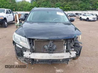 2015 Nissan Pathfinder SL with VIN 5N1AR2MM7FC656931, listed as a IAAI auction lot 42092907 with 156,529 mi miles and . Bid and sale history available at DreamBid. Image 6.