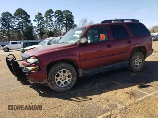 2003 Chevrolet Tahoe LS with VIN 1GNEK13Z93R256421, listed as a Copart auction lot 49001975 with 318,219 mi miles and Salvage Title. Bid and sale history available at DreamBid. Image 1.