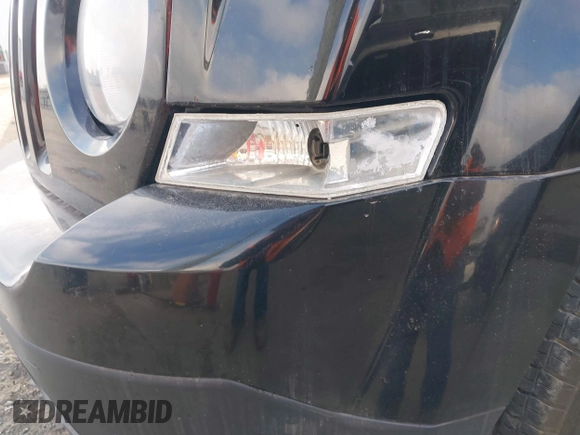 2014 Jeep Patriot Sport with VIN 1C4NJPBB0ED628991, listed as a IAAI auction lot 41781258 with 179,591 mi miles. Bid and sale history available at carsss.com. Image 12.