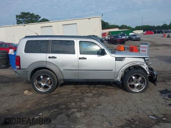 2007 Dodge Nitro SXT with VIN 1D8GU28K37W562598, listed as a IAAI auction lot 42491176 with 202,676 mi miles and . Bid and sale history available at DreamBid. Image 13.