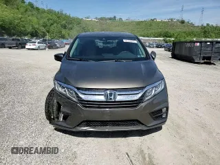 2018 Honda Odyssey EX-L z VIN 5FNRL6H77JB013494, wystawiony jako Copart lot #56348745 z przebiegiem 21 368 mil mil oraz Szkoda całkowita • Salvage title. Historia ofert i sprzedaży dostępna na DreamBid. Obrazek 15.