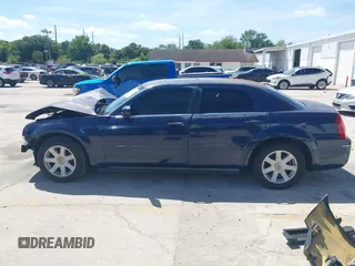 2005 Chrysler 300 with VIN 2C3JA53G25H167944, listed as a IAAI auction lot 41963114 with 196,635 mi miles. Bid and sale history available at carsss.com. Image 15.