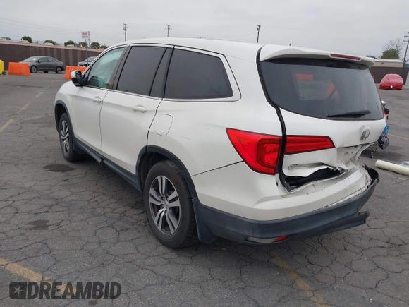 2016 Honda Pilot EX-L with VIN 5FNYF5H54GB037742, listed as a IAAI auction lot 41988112 with 68,459 mi miles and . Bid and sale history available at DreamBid. Image 3.