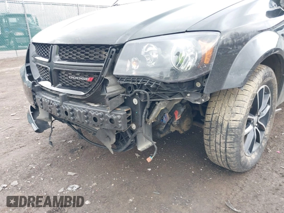 2019 Dodge Grand Caravan SE with VIN 2C4RDGBG8KR524598, listed as a IAAI auction lot 41904137 with 108,308 mi miles and . Bid and sale history available at DreamBid. Image 6.