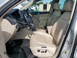 2013 Volkswagen Tiguan S with VIN WVGAV3AX5DW559383, listed as a Copart auction lot 66356005 with 117,271 mi miles and Clean title. Bid and sale history available at DreamBid. Image 7.