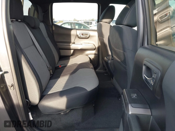 2021 Toyota Tacoma SR5 z VIN 3TMDZ5BN6MM110938, wystawiony jako IAAI lot #41838703 z przebiegiem 67 680 mil mil oraz . Historia ofert i sprzedaży dostępna na DreamBid. Obrazek 8.