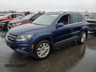 2015 Volkswagen Tiguan SE z VIN WVGBV7AX8FW554533, wystawiony jako Copart lot #48572485 z przebiegiem 161 882 mil mil oraz Czysty tytuł • Clean title. Historia ofert i sprzedaży dostępna na DreamBid. Obrazek 1.