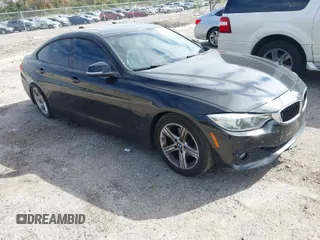 2015 BMW 4 Series 428i z VIN WBA4A9C58FGL85170, wystawiony jako IAAI lot #41362595 z przebiegiem 172 509 mil mil oraz . Historia ofert i sprzedaży dostępna na DreamBid. Obrazek 1.
