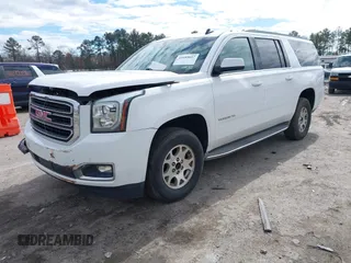 2015 GMC Yukon XL SLT with VIN 1GKS1HKC7FR126375, listed as a IAAI auction lot 41689017 with 218,622 mi miles. Bid and sale history available at carsss.com. Image 17.
