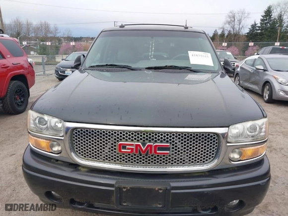 2003 GMC Yukon Denali with VIN 1GKEK63U73J310098, listed as a IAAI auction lot 41831615 with 262,134 mi miles. Bid and sale history available at carsss.com. Image 6.
