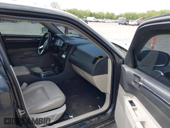 2006 Chrysler 300 Touring with VIN 2C3KA53G36H220558, listed as a IAAI auction lot 42159373 with 158,970 mi miles. Bid and sale history available at carsss.com. Image 5.