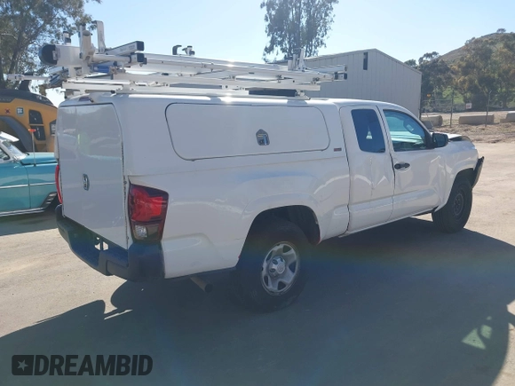 2020 Toyota Tacoma SR with VIN 3TYRX5GNXLT005018, listed as a IAAI auction lot 41851226 with 90,325 mi miles and . Bid and sale history available at DreamBid. Image 4.