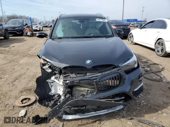2018 BMW X1 xDrive28i with VIN WBXHT3C31J5K25021, listed as a Copart auction lot 48779555 with 71,741 mi miles and Salvage Title. Bid and sale history available at carsss.com. Image 5.