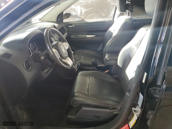 2016 Jeep Compass High Altitude Edition with VIN 1C4NJDEB1GD708457, listed as a Copart auction lot 53028065 with 67,549 mi miles and Salvage Title. Bid and sale history available at carsss.com. Image 7.