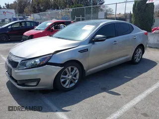 2013 Kia Optima EX z VIN 5XXGN4A70DG148060, wystawiony jako IAAI lot #41900134 z przebiegiem 149 214 mil mil oraz . Historia ofert i sprzedaży dostępna na DreamBid. Obrazek 2.