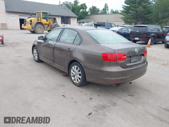 2012 Volkswagen Jetta SE z VIN 3VWDP7AJ7CM072695, wystawiony jako IAAI lot #42616264 z przebiegiem 220 296 mil mil oraz . Historia ofert i sprzedaży dostępna na DreamBid. Obrazek 3.