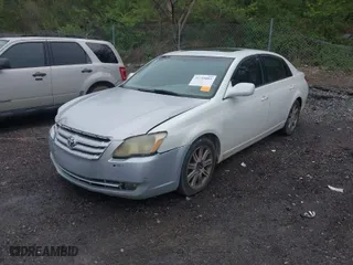 2006 Toyota Avalon XL with VIN 4T1BK36B26U083456, listed as a IAAI auction lot 41758061 with 224,498 mi miles. Bid and sale history available at carsss.com. Image 2.