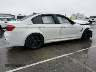 2018 BMW M3 with VIN WBS8M9C58J5J78822, listed as a Copart auction lot 39717984 with 73,682 mi miles. Bid and sale history available at carsss.com. Image 3.