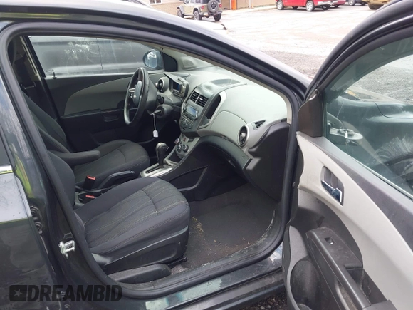 2014 Chevrolet Sonic LT with VIN 1G1JC5SH5E4202854, listed as a IAAI auction lot 42049844 with 150,705 mi miles and . Bid and sale history available at DreamBid. Image 5.