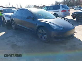 2020 Tesla Model 3 Standard Range Plus with VIN 5YJ3E1EA4LF745491, listed as a IAAI auction lot 41186726 with 74,575 mi miles and . Bid and sale history available at DreamBid. Image 1.