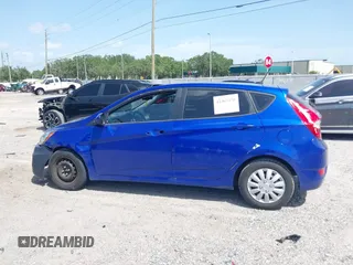2013 Hyundai Accent GS with VIN KMHCT5AEXDU128879, listed as a IAAI auction lot 42463478 with 213,810 mi miles and . Bid and sale history available at DreamBid. Image 14.