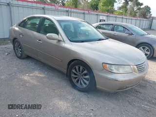 2007 Hyundai Azera SE z VIN KMHFC46F67A162638, wystawiony jako IAAI lot #42053153 z przebiegiem 130 133 mil mil oraz . Historia ofert i sprzedaży dostępna na DreamBid. Obrazek 1.