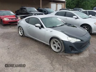 2013 Scion FR-S with VIN JF1ZNAA12D1706687, listed as a IAAI auction lot 42088413 with 1 mi miles. Bid and sale history available at carsss.com. Image 1.